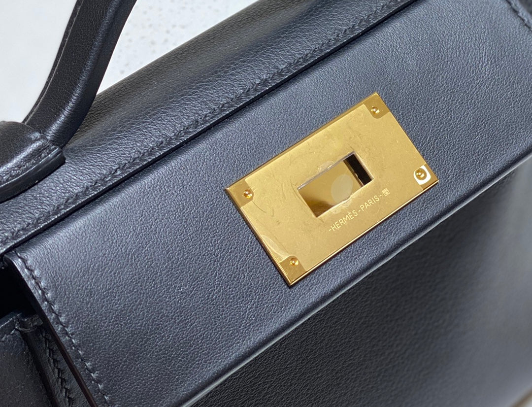MINI 24/24 21CM IN BLACK EVERCOLOR CALFSKIN GOLD KELLY BUCKLE