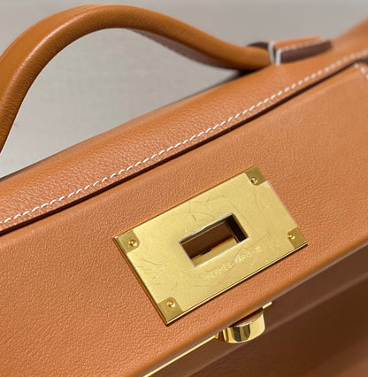 MINI 24/24 21CM IN ORANGE MINIMUM EVERCOLOR CALFSKIN GOLD KELLY BUCKLE