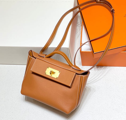 MINI 24/24 21CM IN ORANGE MINIMUM EVERCOLOR CALFSKIN GOLD KELLY BUCKLE