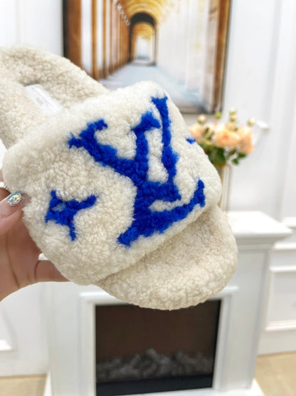 LV FLAT SLIPPER IN WHITE MIX COBALT BLUE SHEARLING