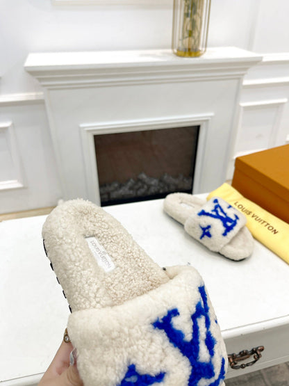 LV FLAT SLIPPER IN WHITE MIX COBALT BLUE SHEARLING