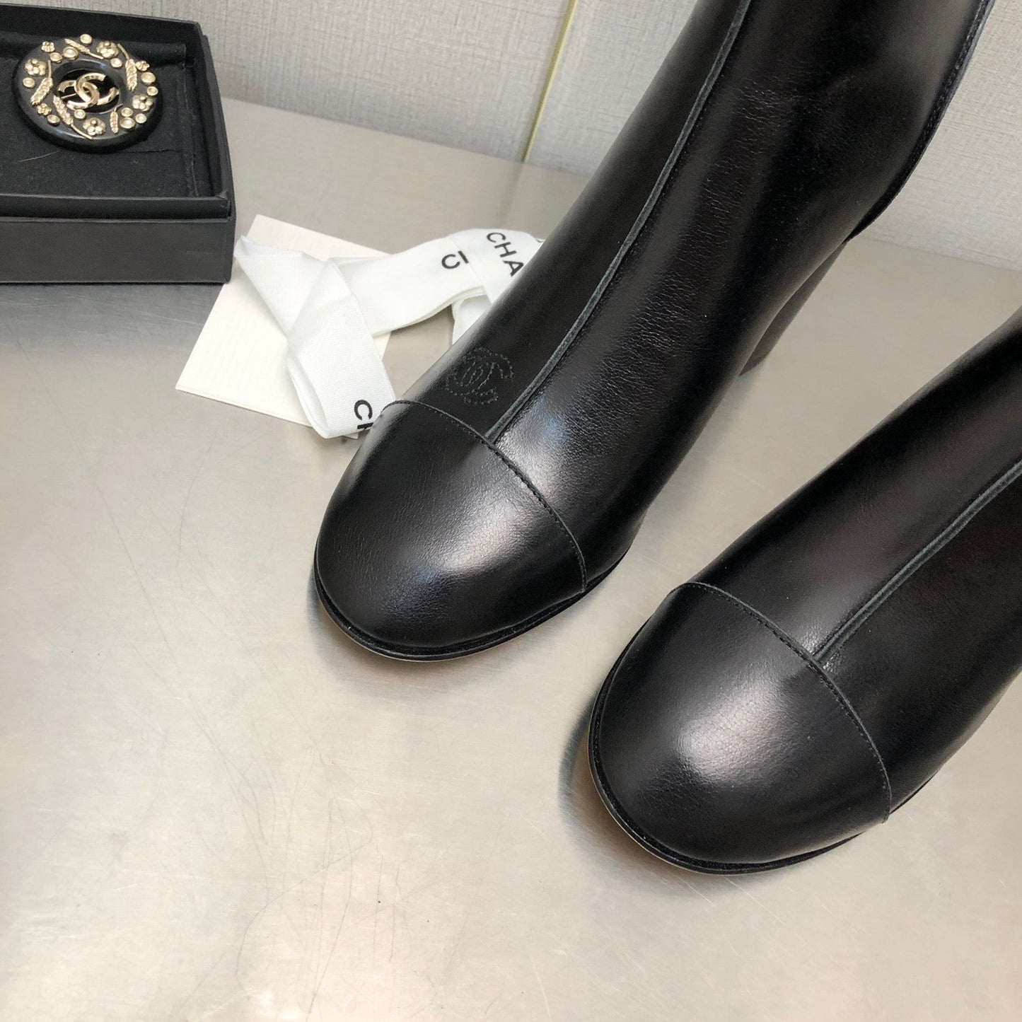 HIGH HEEL ANKLE BOOTS IN BLACK CALFSKIN