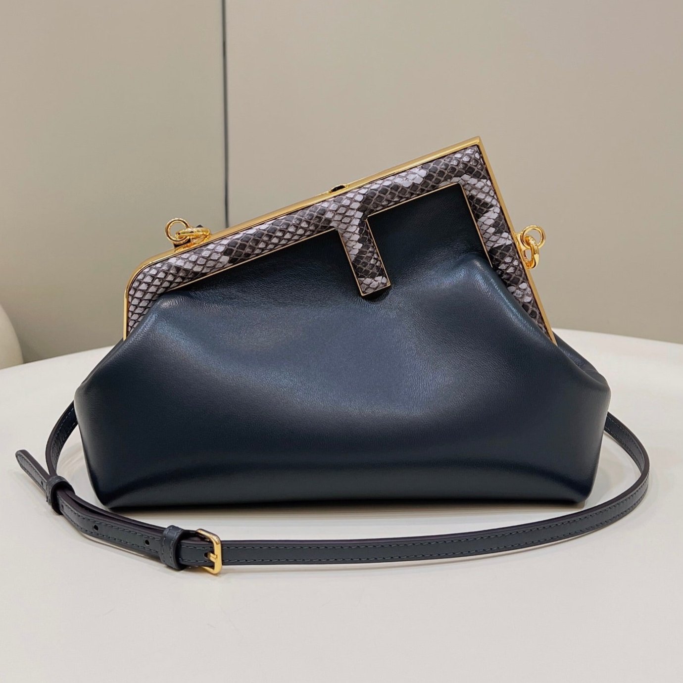 FENDI FIRST SMALL 26 BLACK LEATHER BAG WITH EXOTIC DETAILS