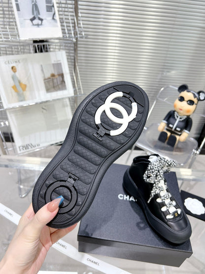 CC CANO ALTO SNEAKER IN BLACK CALFSKIN AND RUBBER