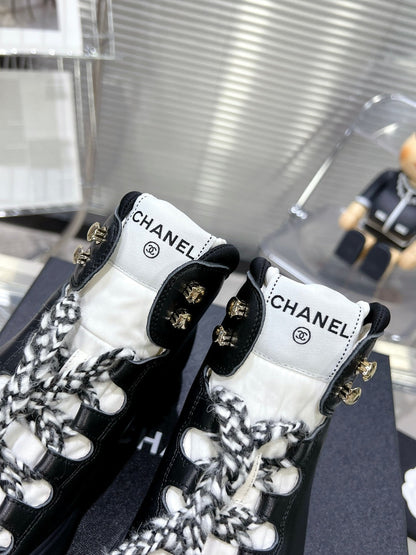 CC CANO ALTO SNEAKER IN BLACK CALFSKIN AND RUBBER