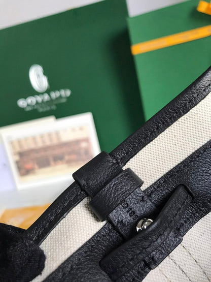 PETIT FLOT BUCKET BAG 22 IN BLACK GOYARDINE CANVAS AND LAMBSKIN TRIM