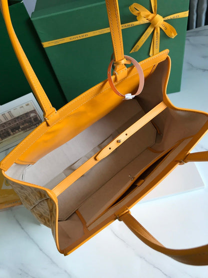 BELLECHASSE BIAUDE PM BAG 36 IN YELLOW GOYARDINE CANVAS AND CALFSKIN TRIM