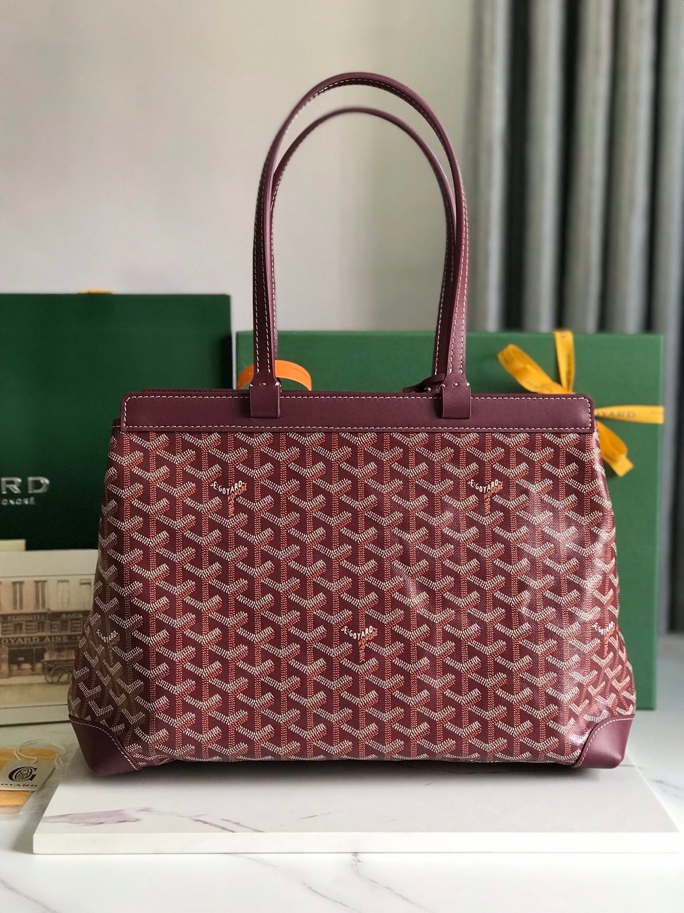 BELLECHASSE BIAUDE PM BAG 36 IN WINE RED GOYARDINE CANVAS AND CALFSKIN TRIM