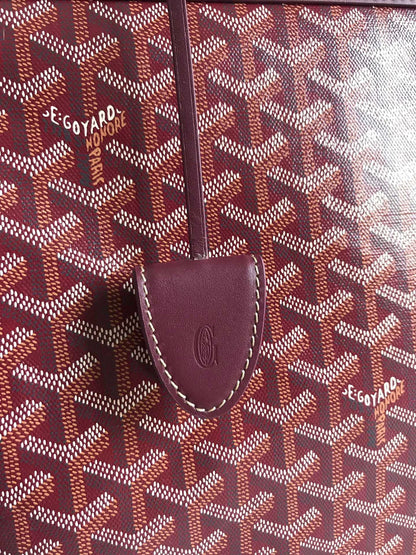 BELLECHASSE BIAUDE PM BAG 36 IN WINE RED GOYARDINE CANVAS AND CALFSKIN TRIM