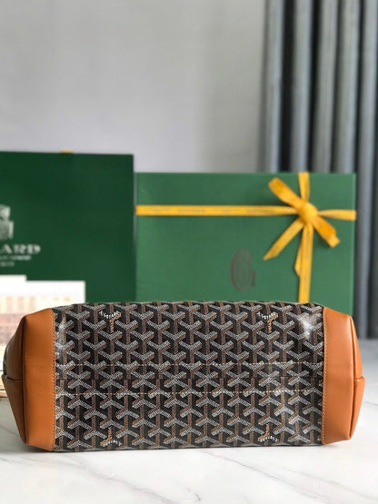 BELLECHASSE BIAUDE PM BAG 36 IN BLACK GOYARDINE CANVAS AND TAN CALFSKIN TRIM