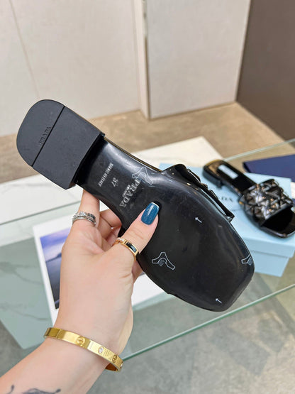 PRA EMBROIDERED SLIDES FLAT BLACK CALFSKIN