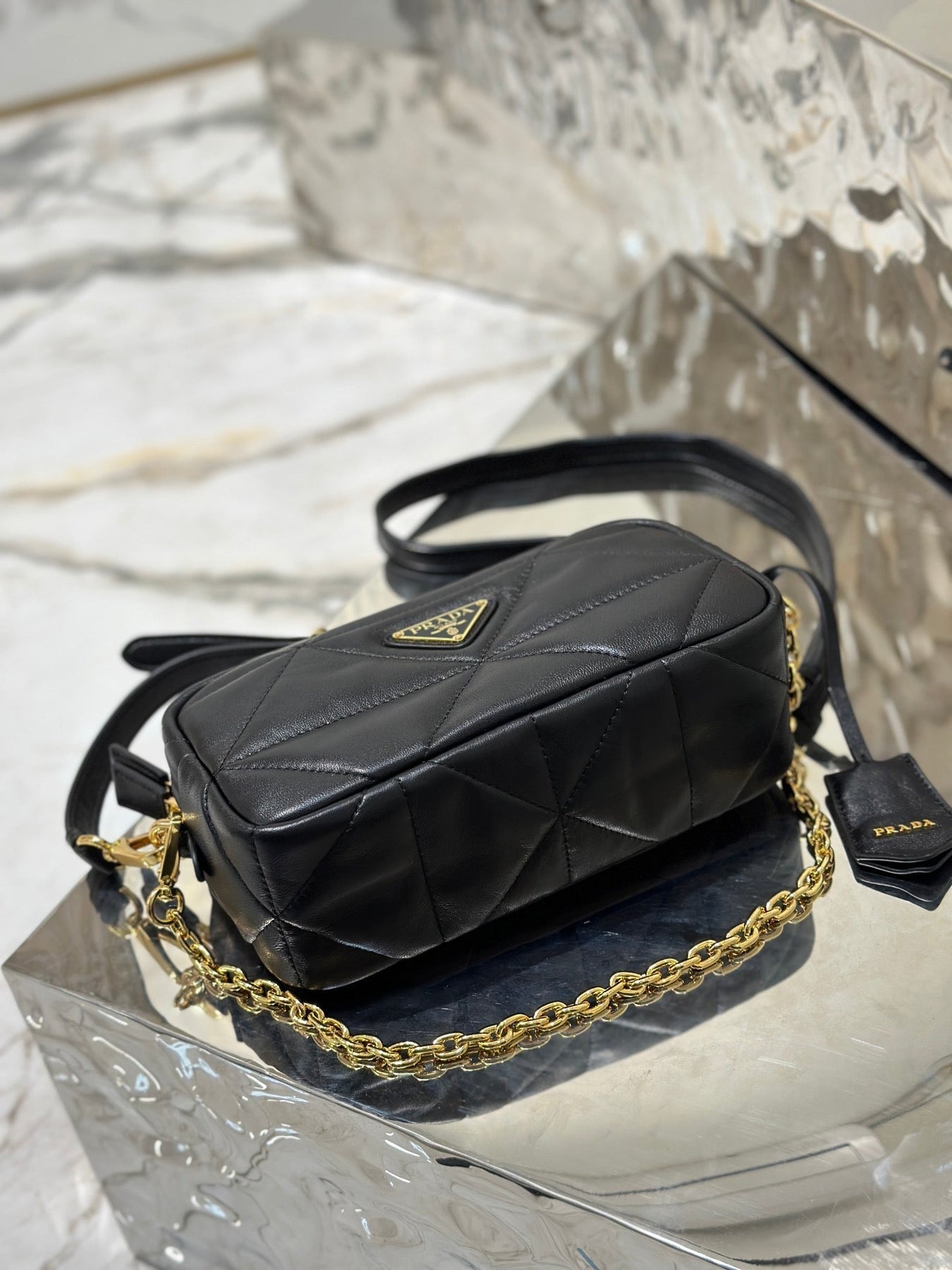 CAMERA BAG 22 IN BLACK TRIANGLE PATTERN QUILTED LAMBSKIN GOLD HARDWARE