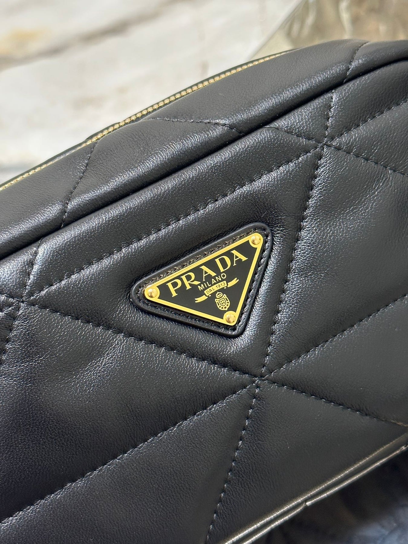 CAMERA BAG 22 IN BLACK TRIANGLE PATTERN QUILTED LAMBSKIN GOLD HARDWARE