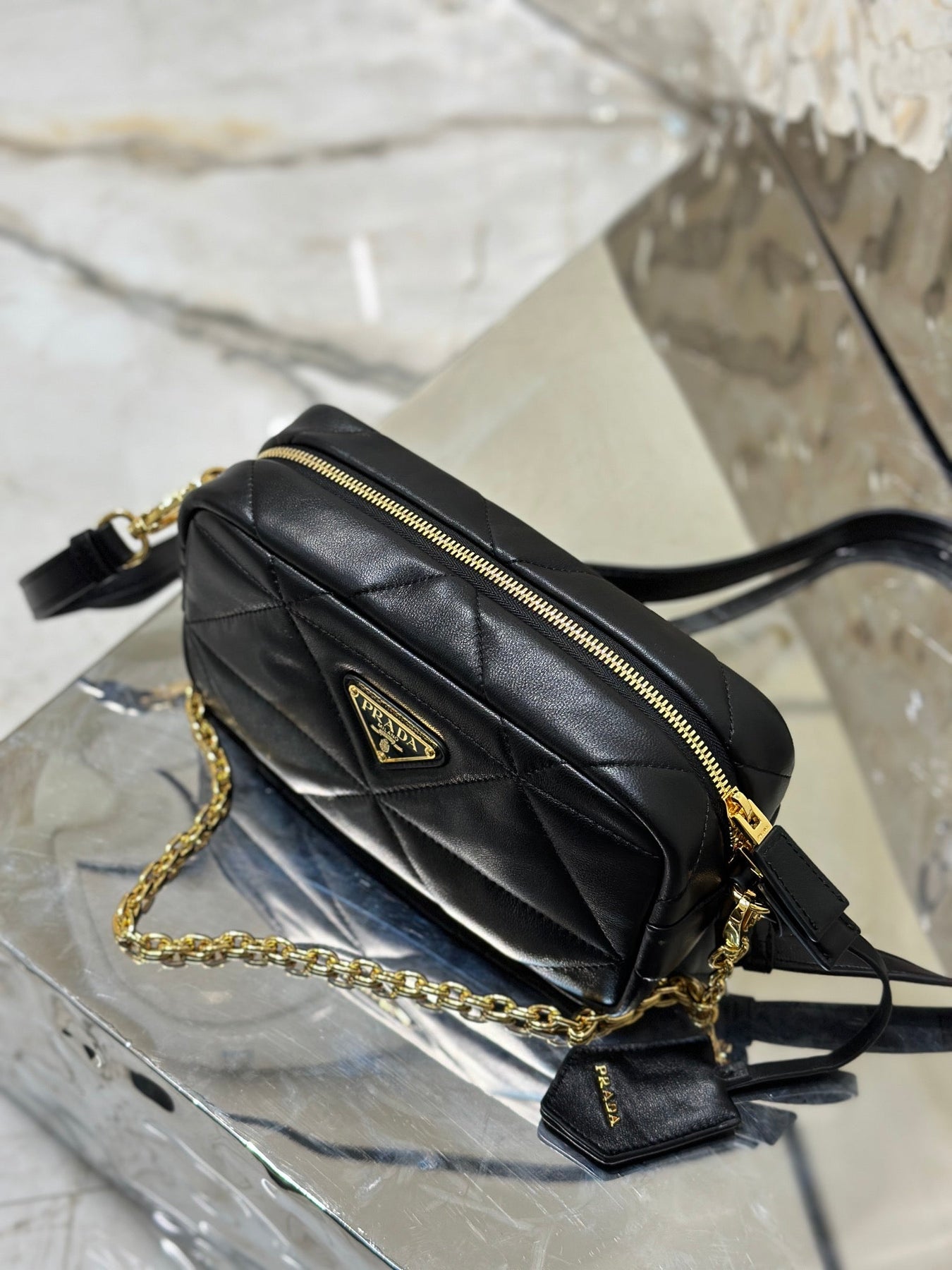 CAMERA BAG 22 IN BLACK TRIANGLE PATTERN QUILTED LAMBSKIN GOLD HARDWARE