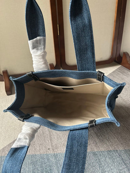 MEDIUM WOODY TOTE BAG 37 IN BLUE DENIM BLACK CALFSKIN