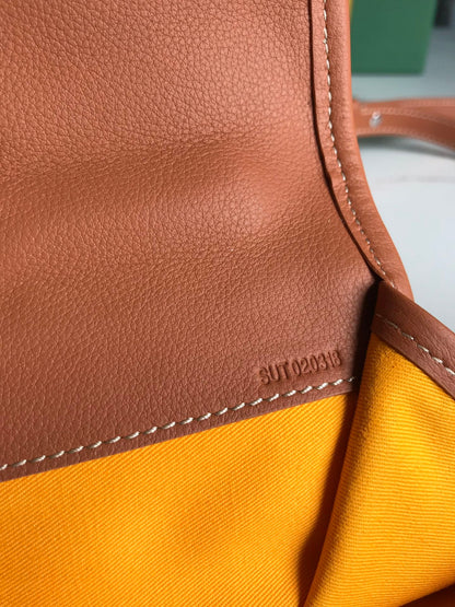 SAINT LÉGER BACKPACK 35 IN BROWN GOYARDINE CANVAS AND CALFSKIN WITH CARTOON PATCH