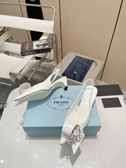 POINTED TOE SLINGBACK KITTEN HEEL WITH FLOWER BOW IN WHITE GLOSSY LAMBSKIN