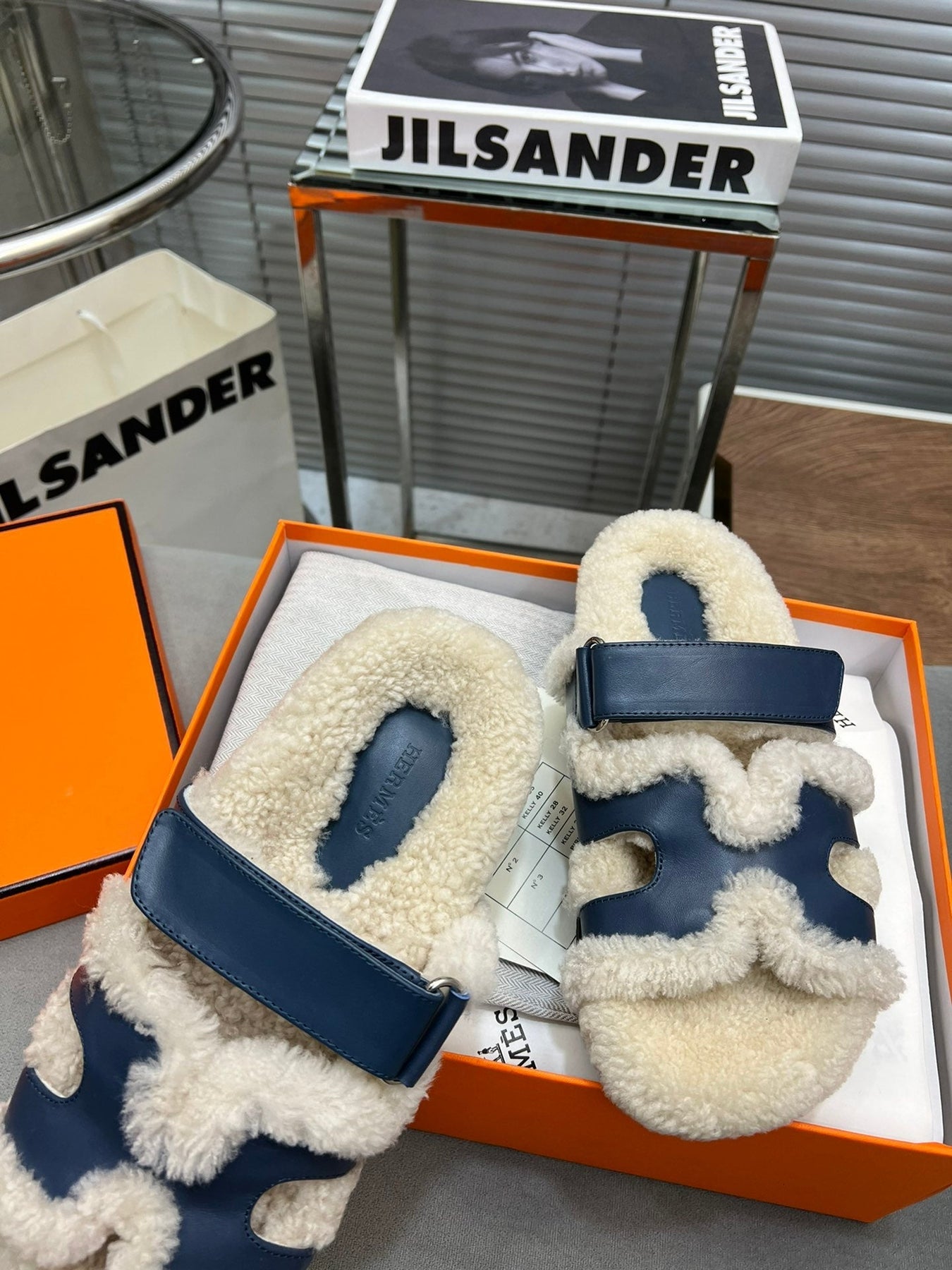 CHYPRE SLIPPERS IN BEIGE LAMB WOOL AND CLASSIC BLUE CALFSKIN