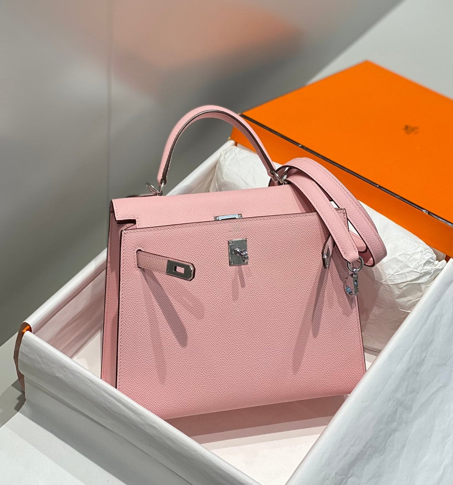 KELLY 25CM IN ROSE SAKURA SWIFT CALFSKIN SILVER HARDWARE