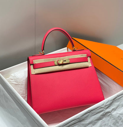 KELLY 28CM IN ROSE TYRIEN SWIFT CALFSKIN GOLD HARDWARE