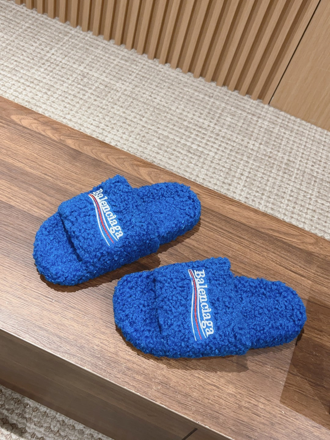 FURRY SLIDES IN COBALT BLUE CURLY SHEARLING