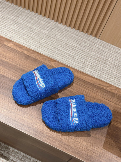 FURRY SLIDES IN COBALT BLUE CURLY SHEARLING