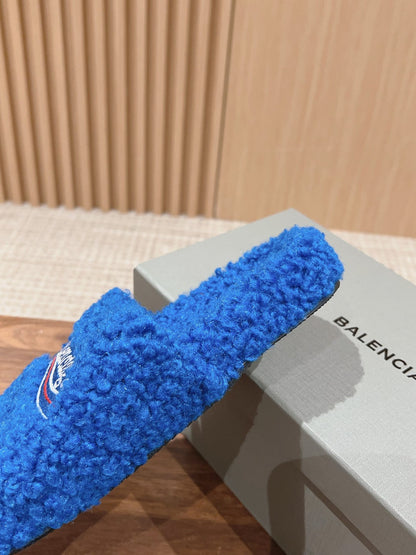 FURRY SLIDES IN COBALT BLUE CURLY SHEARLING