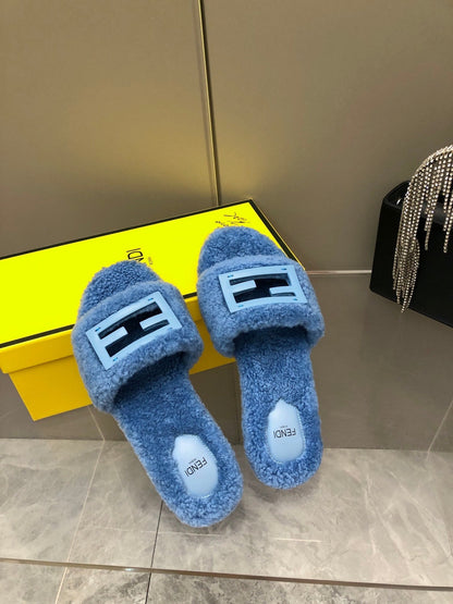 FENDI BAGUETTE SLIDE SLIPPERS IN CERULEAN BLUE WOOL