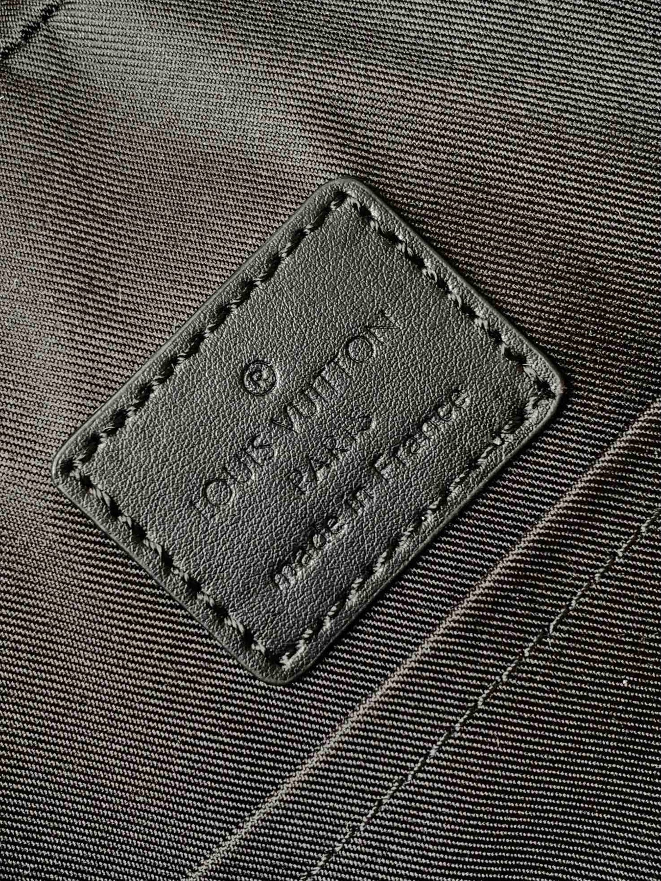 DISCOVERY BACKPACK 41 IN BLACK MONOGRAM MACASSAR CANVAS AND CALFSKIN