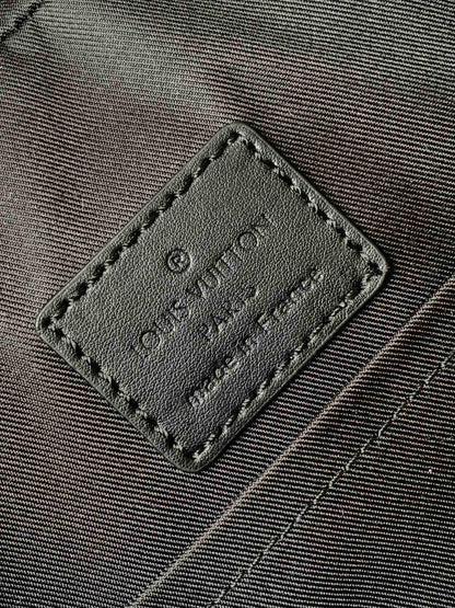 DISCOVERY BACKPACK 41 IN BLACK MONOGRAM MACASSAR CANVAS AND CALFSKIN