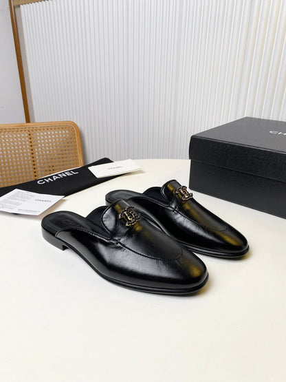 FLAT MULE IN BLACK LAMBSKIN 983818