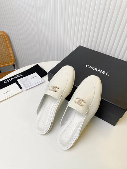 FLAT MULE IN WHITE LAMBSKIN 983819