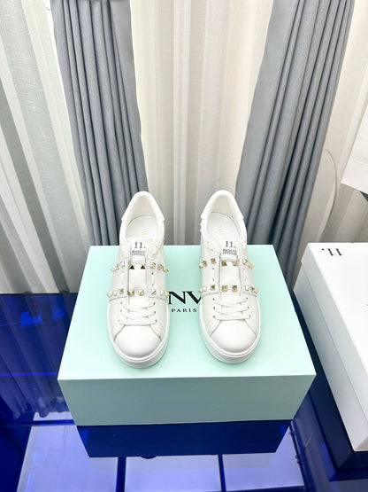 FLATFORM ROCKSTUD UNTITLED SNEAKER IN WHITE CALFSKIN