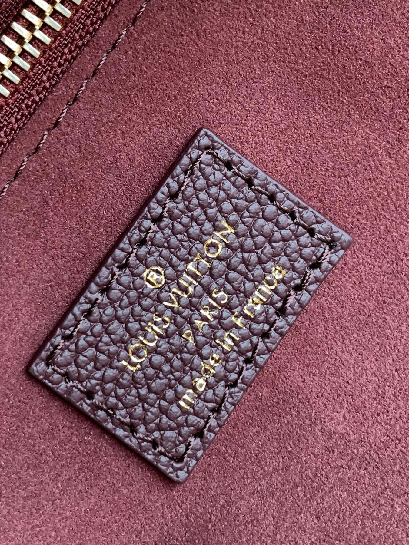 NEVERFULL MM 32 WINE MONOGRAM EMPREINTE LEATHER