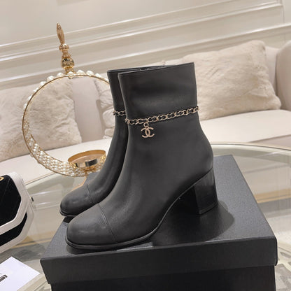 MID-HEEL ANKLE BOOTS IN BLACK SMOOTH CALFSKIN