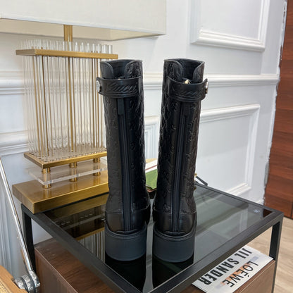 GG EMBOSSED LEATHER ANKLE BOOTS IN BLACK CALFSKIN