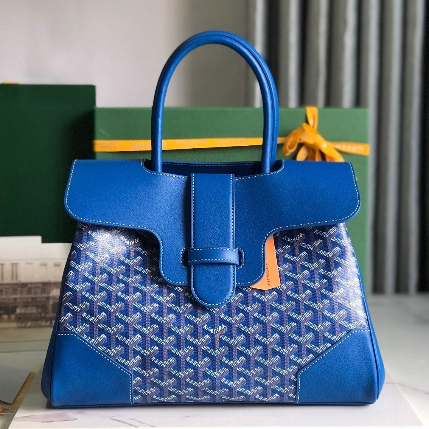 SAIGON SOUPLE BAG 34 IN CURIOUS BLUE GOYARDINE CANVAS AND CALFSKIN