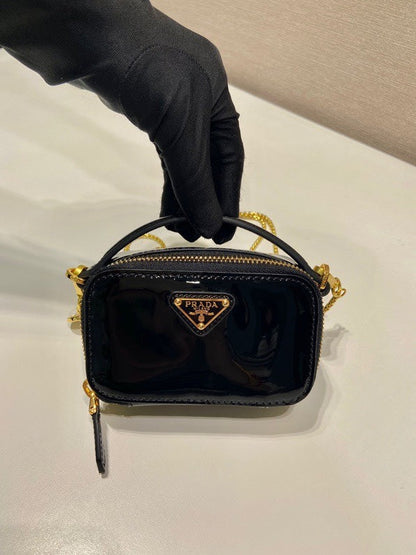 MINI HAND BAG 11 WITH GOLD STRAP IN BLACK PATENT CALFSKIN