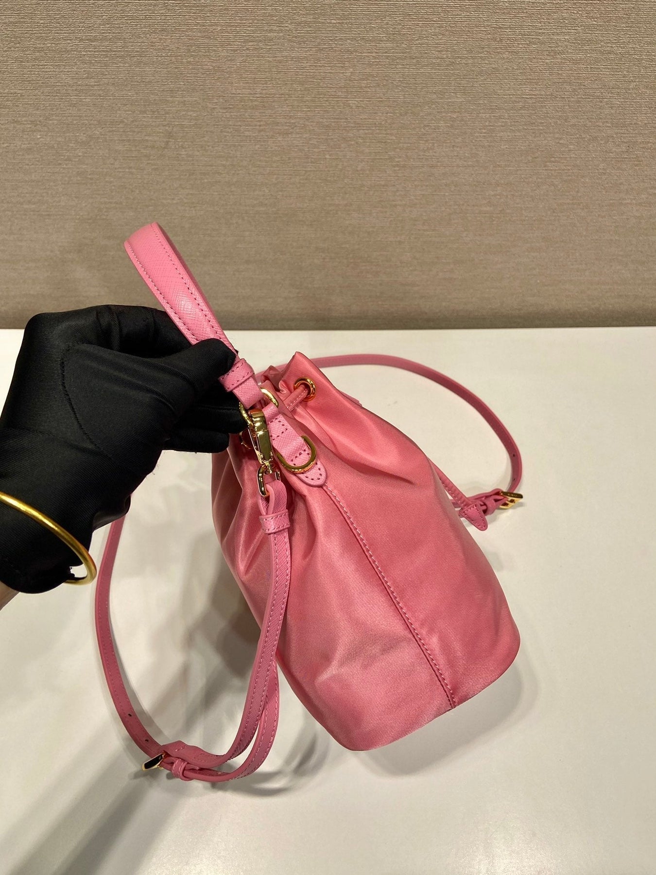 BUCKET BAG 19 IN CANDY PINK RE-NYLON AND SAFFIANO LEATHER HANDLE