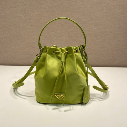 BUCKET BAG 19 IN APPLE GREEN RE-NYLON AND SAFFIANO LEATHER HANDLE