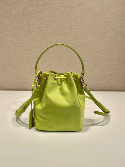 BUCKET BAG 19 IN APPLE GREEN RE-NYLON AND SAFFIANO LEATHER HANDLE