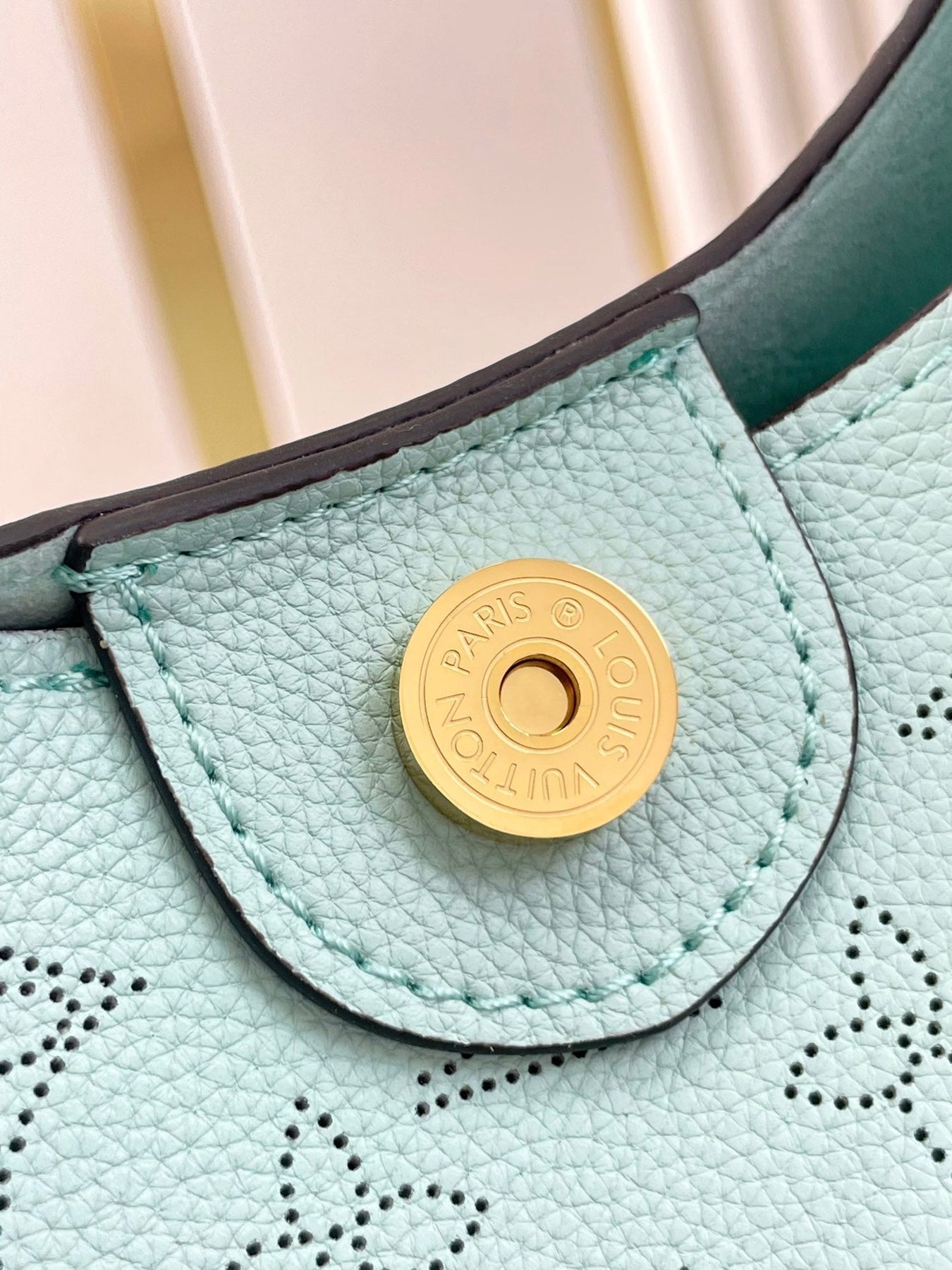 CARMEL 40 IN SKY BLUE MONOGRAM PERFORATED CALFSKIN