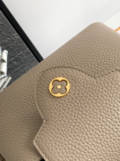 CAPUCINES MINI 21 IN KHAKI BROWN TAURILLON GOLD HARDWARE