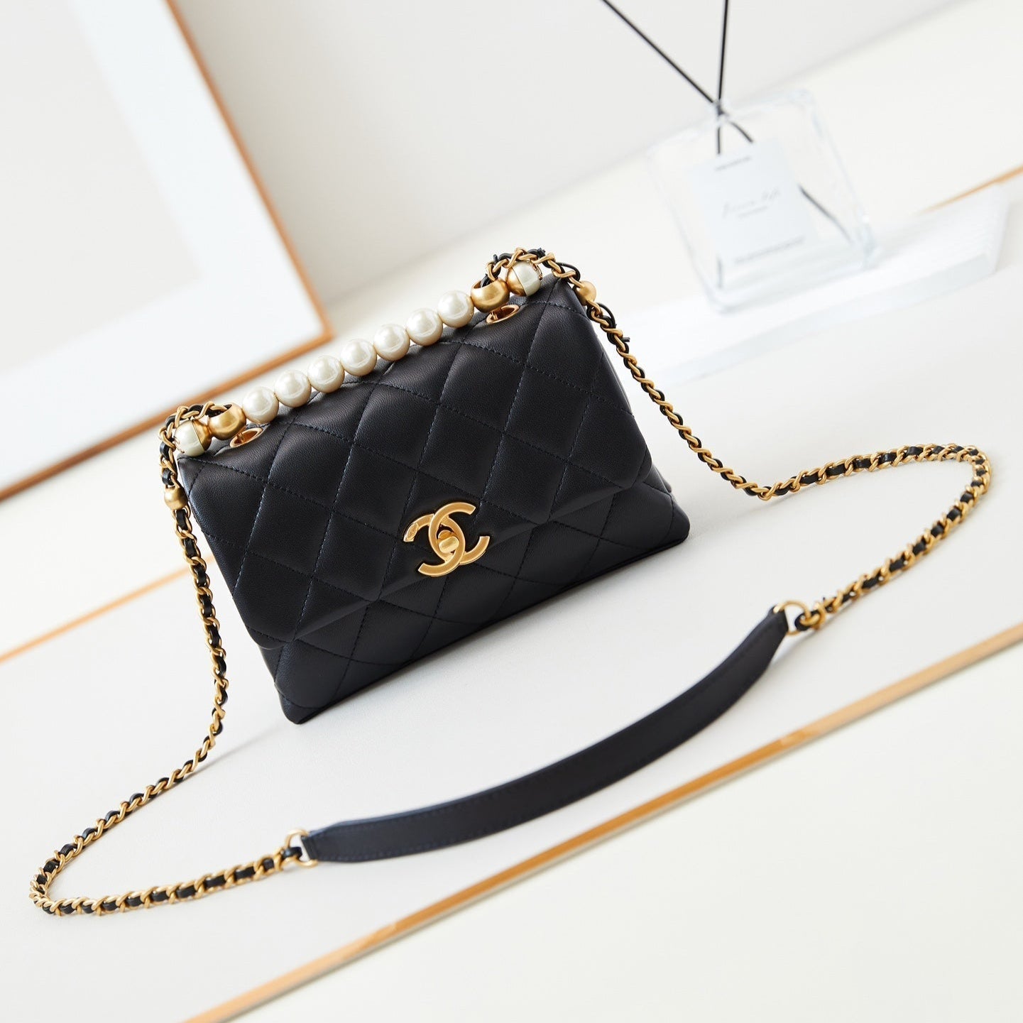 PEARL ATTACHED FLAP BAG 19 IN BLACK QUILTED LAMBSKIN GOLD HARDWARE