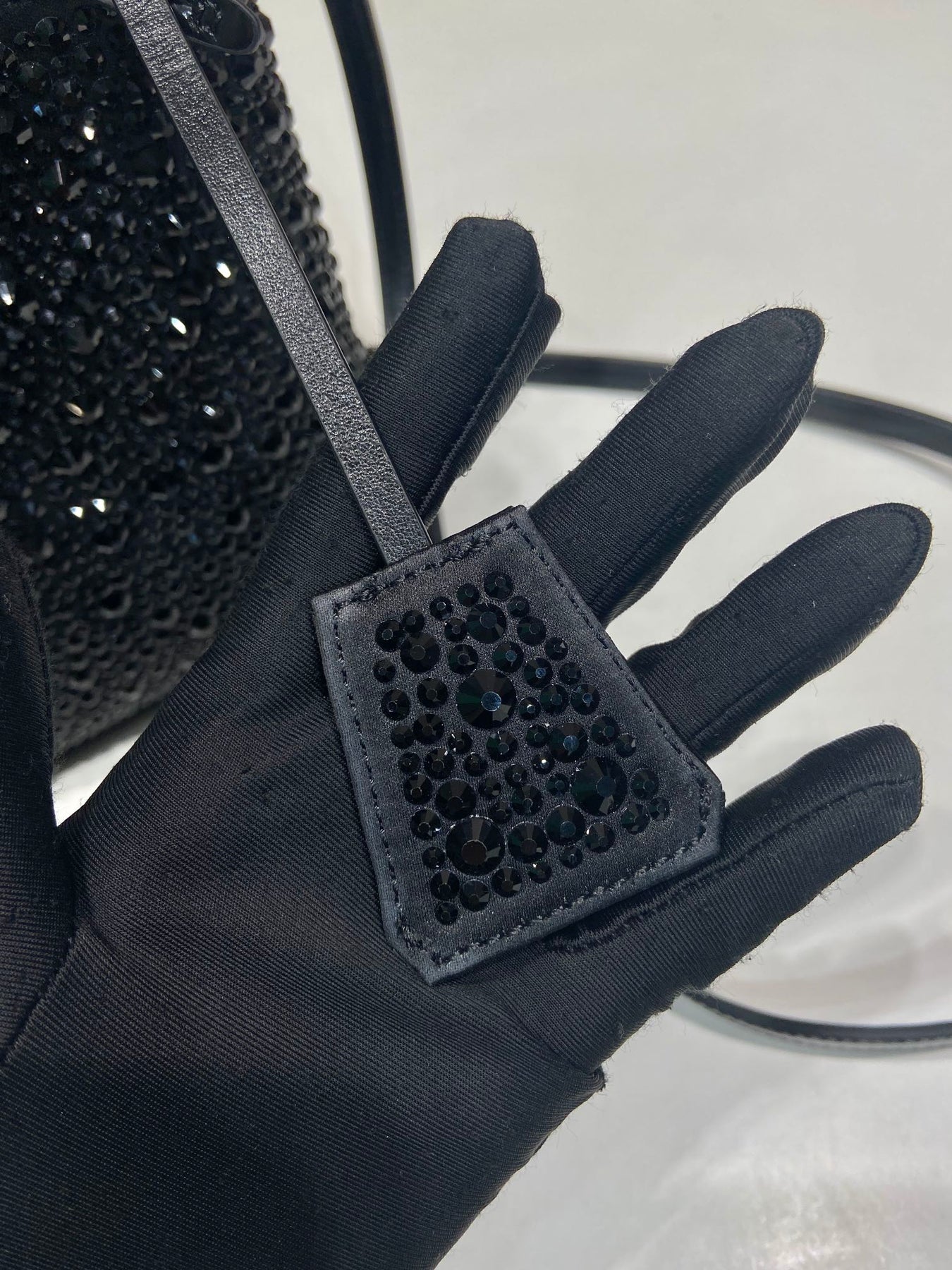 PANIER BUCKET BAG 16 IN BLACK CALFSKIN ATTACHED FULL CRYSTALS