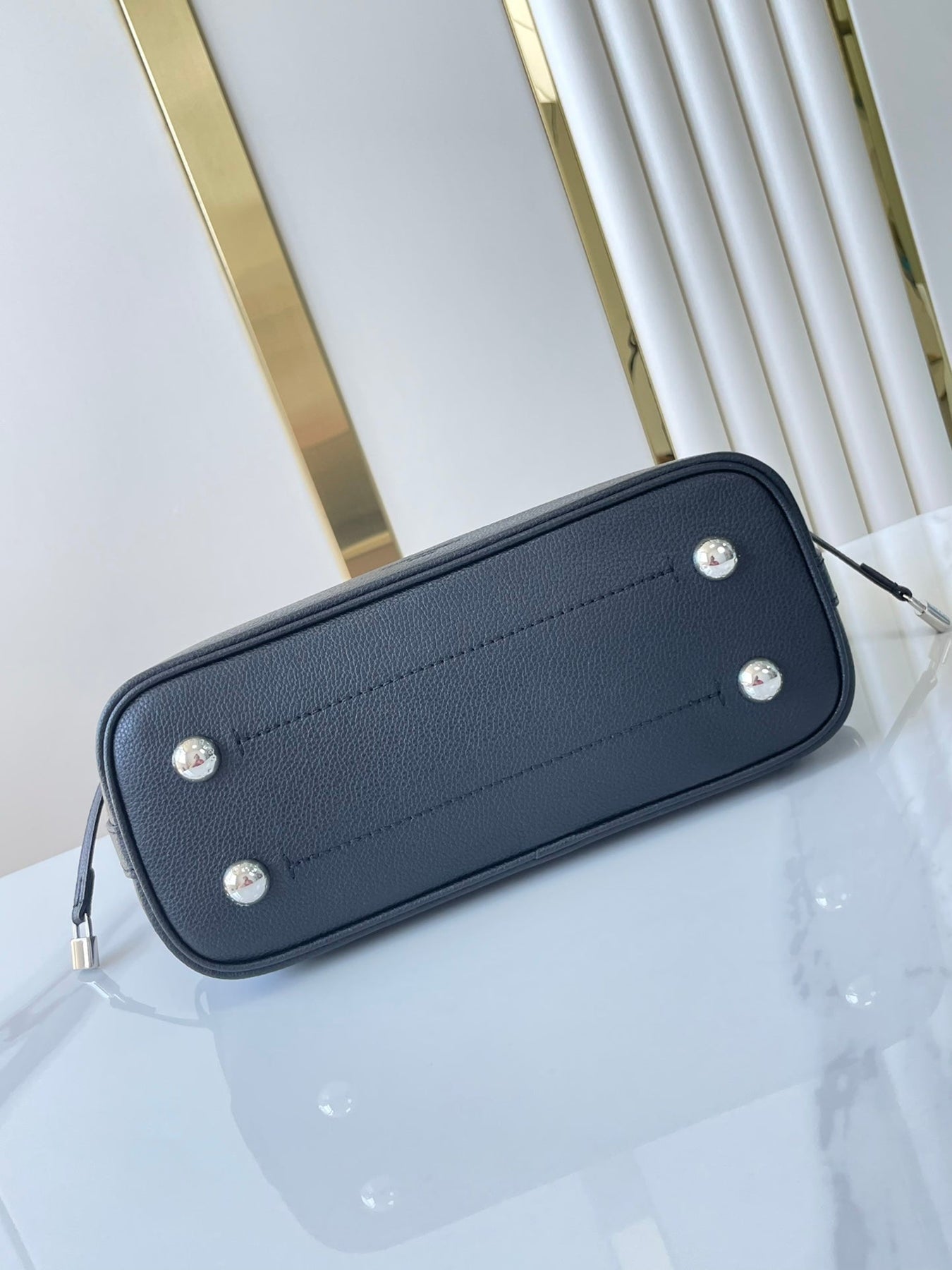 FLORE 28 IN CHARCOAL PERFORATED CALFSKIN