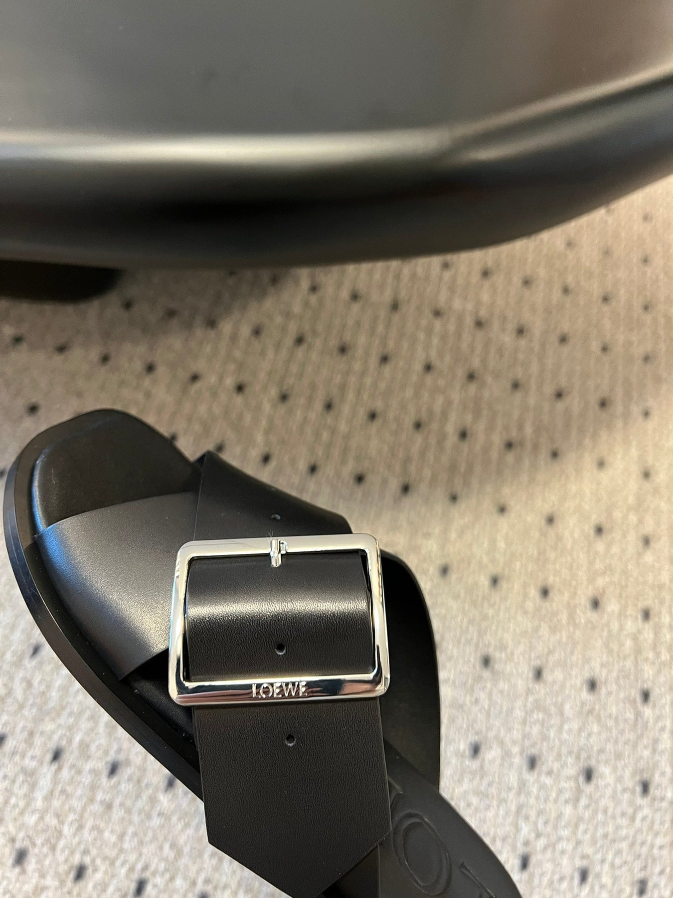 PETAL BELT FLAT SANDAL IN BLACK CALFSKIN