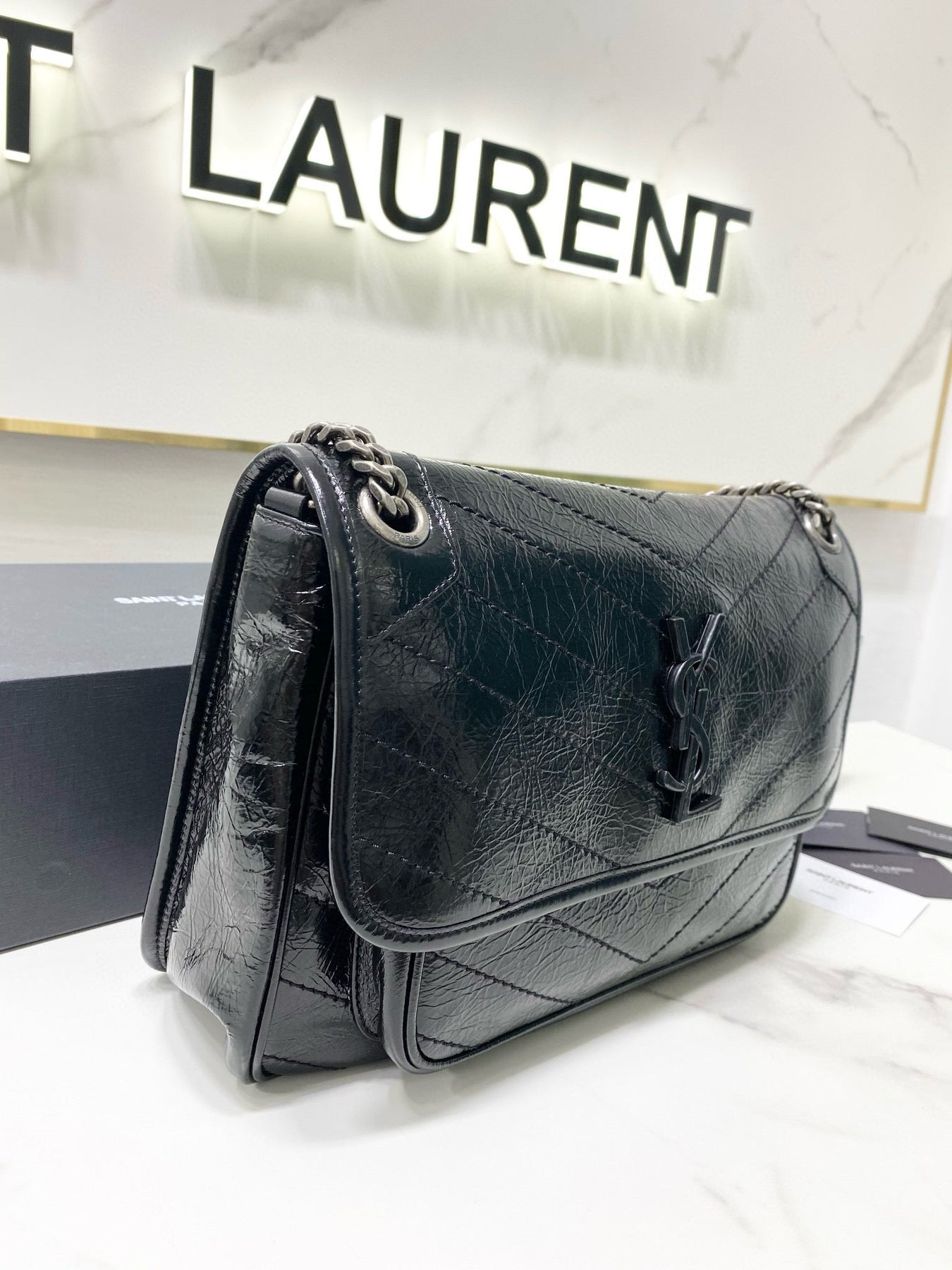 MEDIUM NIKI 28 IN BLACK CALFSKIN CHAIN BAG High-end