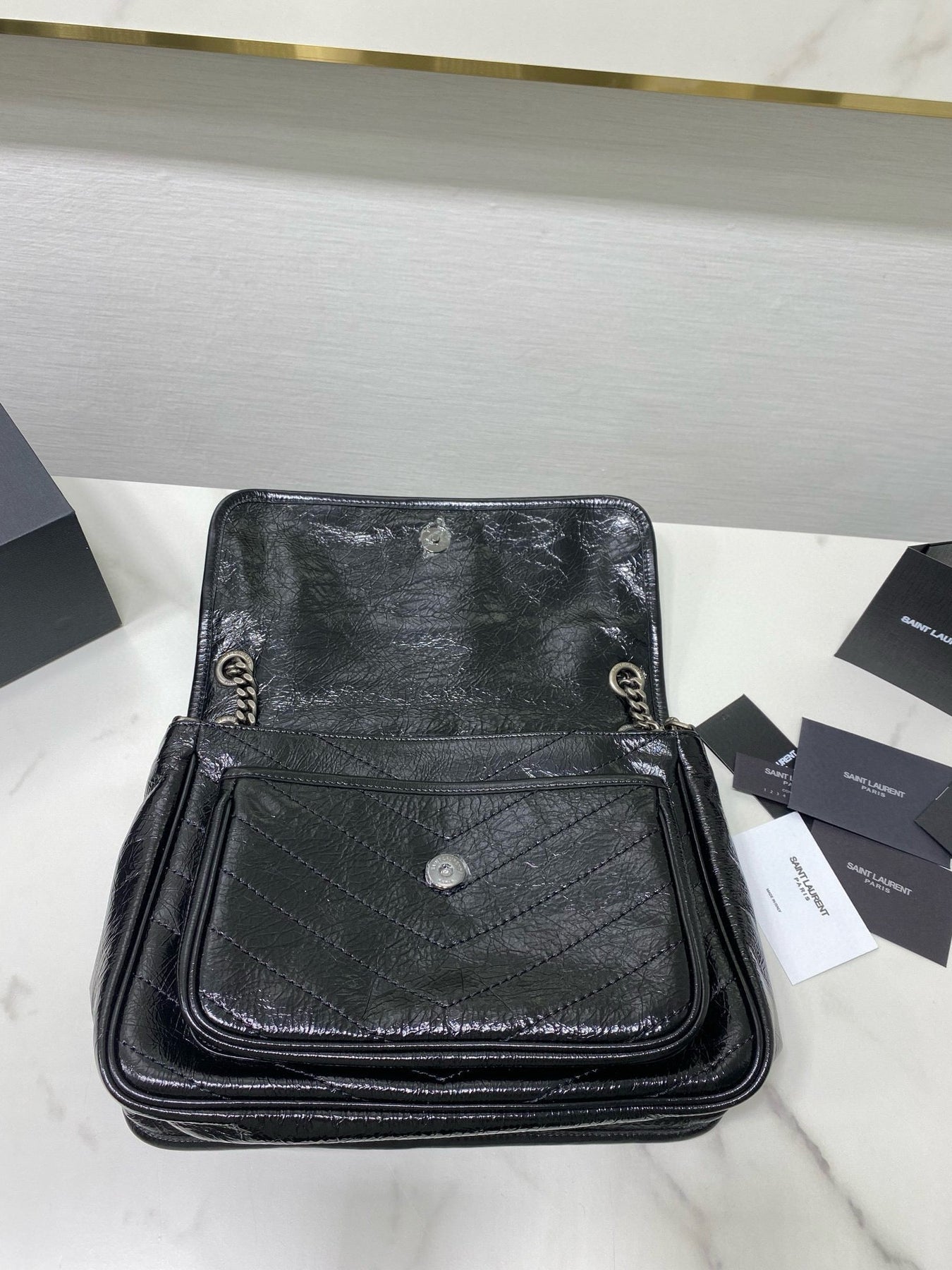 MEDIUM NIKI 28 IN BLACK CALFSKIN CHAIN BAG High-end