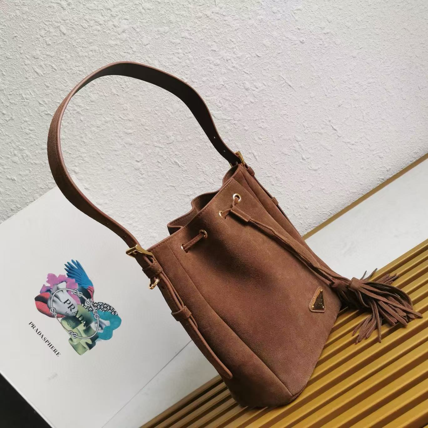 PRA BUCKET BAG 21 IN BROWN SUEDE